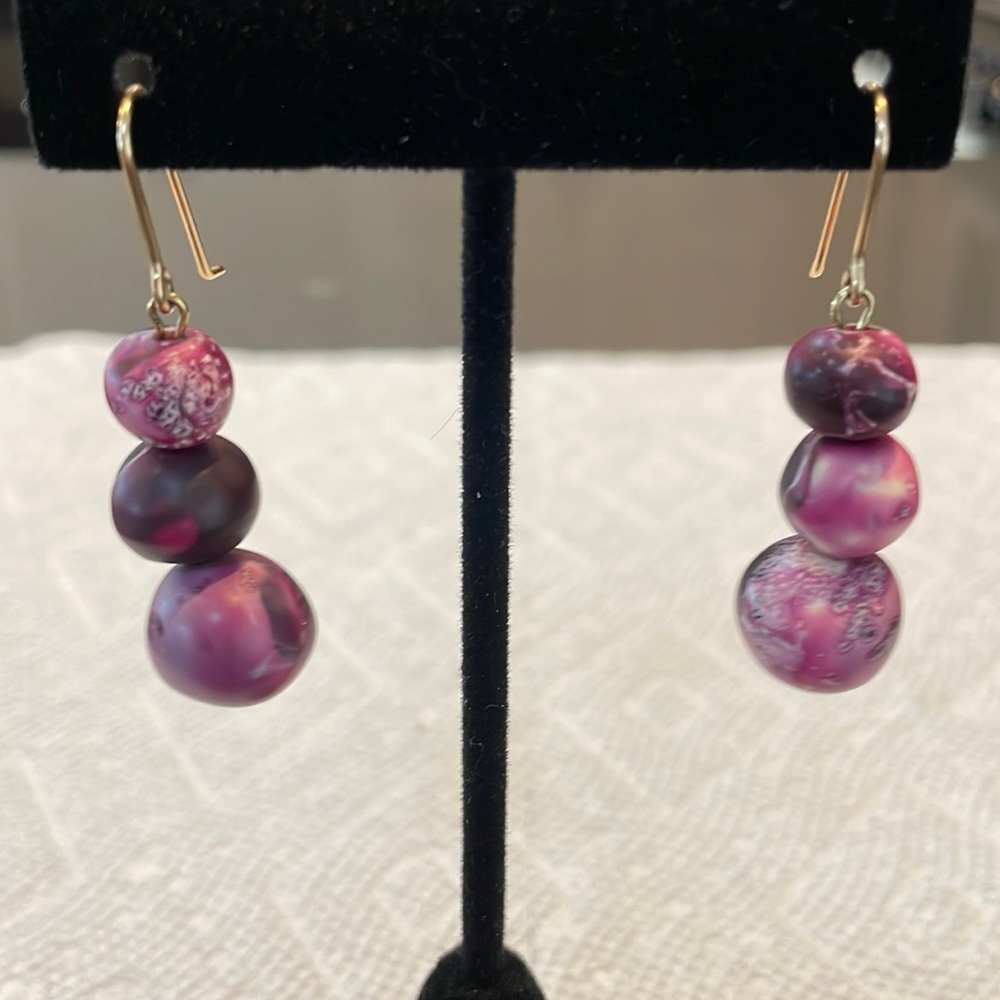 Dinosaur Design triple drop earrings